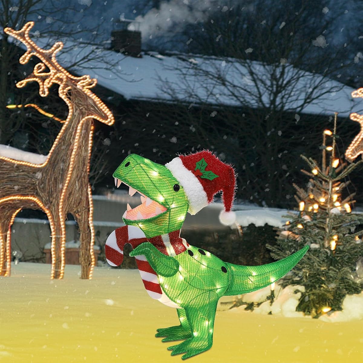 WATERGLIDE Lighted Christmas Green Dinosaur, 22.5 Inch Pre-Lit 3D Tinsel Tyrannosaurus Xmas Red Hat Outdoor Yard Decor, Light Up with Clear Lights & Plug in for Festive Holiday Garden Lawn Display - imagen de detalle 2